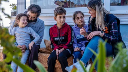 Ahmad and his three children at home in Hatay, navigating daily life and new challenges in the aftermath of the earthquake.